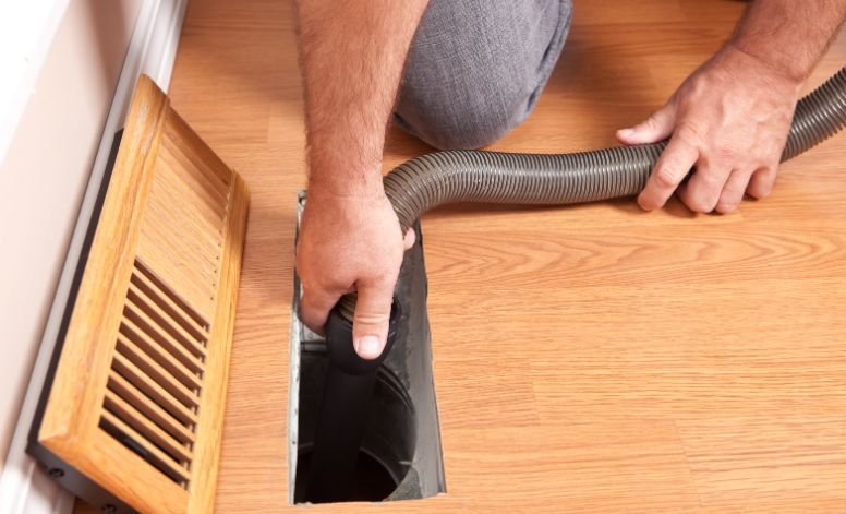 Experts Cleaning out air ducts